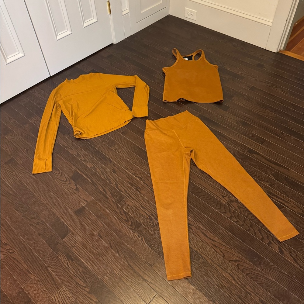 Prana three-piece Becksa set in gold.